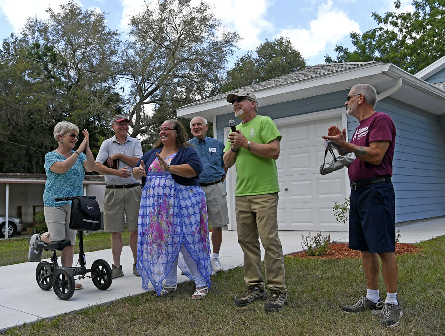 Villages club builds, Dedicates first home
